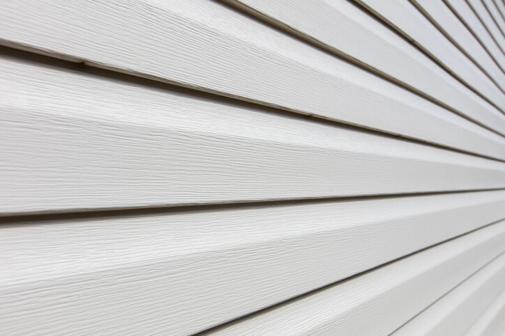 Vinyl siding repair by Act Fast Masonry & Construction LLC